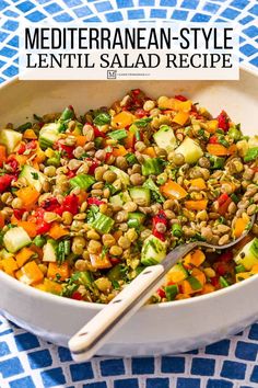 a white bowl filled with lentil salad on top of a blue and white table cloth