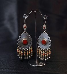 Vintage Turkmen silver earring hand made with natural stone coral and carnelian stones Traditional Silver Agate Jewelry, Artisan Red Earrings With Natural Stones, Traditional Sterling Silver Earrings With Natural Stones, Artisan Red Dangle Earrings, Traditional Red Earrings With Natural Stones, Silver Carnelian Teardrop Jewelry, Red Agate Earrings As Gift, Red Agate Dangle Earrings, Silver Teardrop Carnelian Jewelry