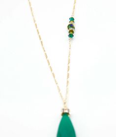 A large Emerald green Adventurine Crystal is adorned with a Swarovski Rhinestone rondelle and cap. 34”in length this amazing necklace is everyday wear or perfect for a dressy occasion. Dangles with easy movement from 14k gold fill or sterling silver. Extremely high quality chain and clasp with all closed jump rings. Side detail makes the necklace absolutely amazing, green Swarovski crystals. Available in Sterling silver or 14K gold fill chain.Custom Length available, just ask!Match with the Lind Elegant Green Long Necklace As Gift, Single Strand Green Jewelry For Party, Green Faceted Necklace For Party, Green Single Strand Jewelry For Party, Green May Birthstone Long Drop Jewelry, Elegant Green Long Necklace For Party, Elegant Green Single Strand Crystal Necklaces, Green Single Strand Jewelry For Wedding, Green Single Strand Long Necklace