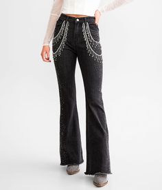 Blue B Ultra High Rise Rhinestone Fringe Flare Stretch Jean - Blue Medium/Long, Women's Washedblack Ultra high rise Inseam measures 33 Slim through the hip and thigh 20 flared bottom opening Frayed hem details. This quality denim is hand-finished for a unique look. It will wear like your favorite jeans, with each hole and tear continuing to destruct over time. You will love the comfort of this denim that has the look and feel of years of wear. . 75% Cotton 20% Polyester 3.5% Viscose 1.5% Spandex Rhinestone Fringe Jeans, Jeans With Fringe, Rave Fits, Fringe Jeans, Rhinestone Jeans, Gothic Women, Denim And Diamonds, High Waisted Black Jeans, Rhinestone Fringe