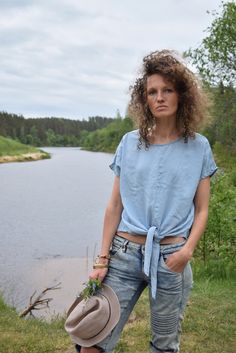 "Excellent denim blouse for your midsummer nights. It is not a mistake - buttons are on the back! Size: label says S, seems like women's (S) MEASUREMENTS: Length: 57 cm/ 22\" (without ties) Shoulder to shoulder: 50 cm/ 20\" Chest: 116 cm/ 46\" Condition: excellent Fabric: Lyocell Brand: unknown * Wash at temperature not higher than 30oC / 86oF Model wears: UK 8/ EU 36/ US 4 Model's height: 175 cm/5'7\" You can find more similar shirts here: https://www.etsy.com/shop/OnTheRoadStore?section_id=239 Summer Washed Denim Top With Short Sleeves, Casual Washed Blue Summer Blouse, Summer Washed Blue Relaxed Fit Blouse, Washed Blue Relaxed Fit Summer Blouse, Washed Blue Relaxed Fit Blouse For Summer, Summer Medium Wash Denim Shirt, Medium Wash Summer Shirt, Denim Blue Short Sleeve Blouse For Day Out, Indigo Short Sleeve Denim Top For Summer