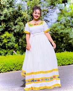 Experience the radiant elegance of Ethiopian traditional dress with our beautiful yellow Habesha dress. This modern Habesha Kemis combines contemporary style with timeless cultural heritage, making it a stunning choice for any occasion. Its vibrant yellow hue and sophisticated design celebrate the beauty and tradition of Ethiopia. Material Cotton Menen Thread Estimated delivery : 2 weeks to 3 weeks Contact WhatsApp +1(304)-306-2784Email: contact@ethiopian.store Habesha Dress Modern, Ethiopian Traditional Dress, Habesha Dress, Habesha Kemis, Dress Modern, Traditional Clothes, Modern Dress, Traditional Dress, Pitcairn Islands