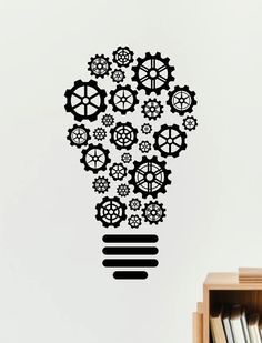 a wall decal with gears in the shape of a light bulb