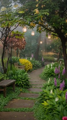 a garden with lots of trees and flowers in the foggy day, next to a wooden bench