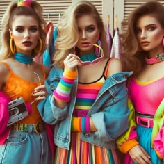 three beautiful young women standing next to each other wearing colorful outfits and holding up sunglasses