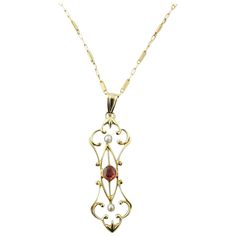 Vintage 14 Karat Yellow Gold and Rhodolite Garnet Pendant- This unique custom made pendant was upscaled from a vintage pin and features a rhodolite garnet (4 mm) accented with two seed pearls and set in ornate 14K gold on a lovely 18 inch 14K gold chain. Pendant measures 34 mm x 12 mm. Size: 18 inches Weight: 2.5 . / 3.9 gr. Hallmark: 14K Italy Very good condition, professionally polished. Will come packaged in a gift box and will be shipped U.S. Priority Mail Insured. Gold Chain Pendant, Garnet Pendant, Rhodolite Garnet, Seed Pearl, Chain Pendant, Vintage Pins, Priority Mail, Gold Chains, Garnet