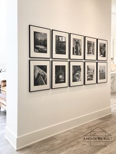 black and white photographs hanging on the wall