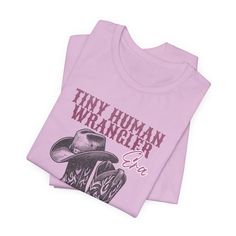 Introducing our exclusive Neonatal Intensive Care Unit NICU Tiny Human Wrangler T-Shirt!  This tee is perfect for Neonatal Nurses, Doctors, Respiratory Therapists, Social Workers, Child Life Specialists, Nurse Practitioners, Unit Clerks, Nutritionists, Physical and Occupational Therapists, Volunteers, and all Neonatal Intensive Care Unit (NICU) Support Staff. Show your appreciation for the dedicated NICU team with this cozy and stylish shirt. It's not just a piece of clothing; it's a heartfelt w Child Life Specialist, Neonatal Nurse, Neonatal Intensive Care Unit, Respiratory Therapist, Social Workers, Intensive Care Unit, Nurse Practitioner, Intensive Care, Child Life