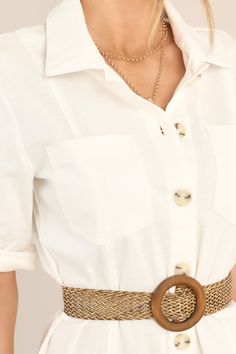 Stay cool and stylish in this breathable Reach Land's End Ivory Button Down Shirt Dress. With its cute and simple design, this classic dress is perfect for any occasion. Perfect for a casual day out or dressed up for a night on the town. Features a collar neckline, functional buttons, roll tab sleeves, a detachable woven & wooden belt, and two breast pockets. 97% Cotton, 3% Spandex Hand Wash Cold Unlined Belt measures 40.5" Imported Model is wearing a size small Summer Button-up Shirt Dress With Pockets, Summer Workwear Shirt Dress With Button Cuffs, Trendy Collared Shirt Dress For Summer, Chic Summer Shirt Dress With Button Cuffs, Casual White Shirt Dress With Buttons, Summer Button-up Shirt Dress With Rolled Sleeves, Summer Shirt Dress With Rolled Sleeves And Button-up Shape, Casual Spring Shirt Dress With Collar, Chic Shirt Dress With Rolled Sleeves For Day Out