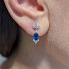 Our bridal drop earrings set with blue sapphires and diamonds are perfect for brides who want to add glamour and color to their bridal look in a subtle and elegant way. Available in 14k and 18k yellow rose and white gold, as well as platinum--just choose your desired metal from the drop-down menu! These earrings are fully customizable. Prefer different dimensions? Would you like to add ruby or emeralds or other colored gemstones in place of blue sapphires and diamonds? Contact us today for a no- Blue Sapphire Oval Diamond Earrings, Elegant Blue Oval Diamond Earrings, Formal Blue Pear-shaped Diamond Earrings, Sapphire Diamond Drop Earrings In Fine Jewelry Style, Sapphire Diamond Drop Earrings, Blue Pear-shaped Diamond Earrings For Anniversary, Elegant Tanzanite Dangle Earrings, Elegant Blue Diamond Dangle Earrings, Elegant Diamond Earrings With Gemstone Accents