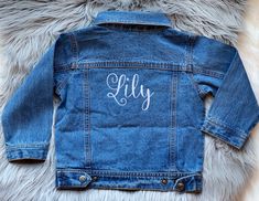 "Hello and welcome to my shop!! Here we have our super cute denim jackets. I can add a name to the front left or to the back of the jacket. These are perfect for that cute birthday picture. I can also add your favorite school or logo to them. Make sure to let me know what thread color at checkout. If not specified I'll do it in white If you would like to add flowers, stars, hearts or other designs to the jacket purchase extra monograms here: https://www.etsy.com/listing/796309653/add-to-my-order Customizable Blue Denim Jacket, Customizable Cotton Fall Outerwear, Customizable Denim Jacket For Fall, Customizable Denim Outerwear For Fall, Customizable Long Sleeve Denim Outerwear, Trendy Customizable Outerwear For Spring, Trendy Denim Jacket For Fall Customization, Customizable Cotton Denim Jacket For Fall, Customizable Blue Denim Jacket For Spring