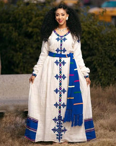 Indulge in the mesmerizing depths of sapphire with our vibrant blue Habesha Kemis, a celebration of fertility and cultural heritage that exudes timeless elegance. Crafted with meticulous attention to detail, this dress embodies the richness of Ethiopian tradition, adorned with intricate patterns that symbolize growth and abundance. The vibrant blue hue evokes a sense of serenity and vitality, making it the perfect attire for cultural ceremonies and joyous occasions. Habesha Kemis Ethiopian Dress, Habesha Dress Modern, Sindhi Dress, Ethiopian Culture, Ethiopian Traditional Dress, Habesha Dress, Ethiopian Dress, Habesha Kemis, Dress Modern