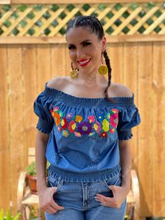 This Beautiful Off the Shoulder Crop Top is the perfect Top for a fun day out or special event. It is comfortable, has elastic around the shoulders, sleeves and waist. This blouse is completely hand embroidered by Mexican Artisans in Guanajuato, Mexico making it one of a kind! More colors available here: https://www.etsy.com/es/listing/936613756/blusa-crop-top-floral-blusa?ref=listings_manager_grid Shop the Artisanal earrings modeled here: https://www.etsy.com/es/listing/918692155/aretes-mexican Bohemian Denim Top For Spring, Spring Festival Denim Top, Bohemian Tops For Spring Fiesta, Bohemian Embroidered Denim Tops, Bohemian Tops For Fiesta And Festivals, Bohemian Embroidered Top For Fiesta In Spring, Bohemian Blouse For Fiesta Festival, Embroidered Tops For Cinco De Mayo Festival, Summer Embroidered Denim Top