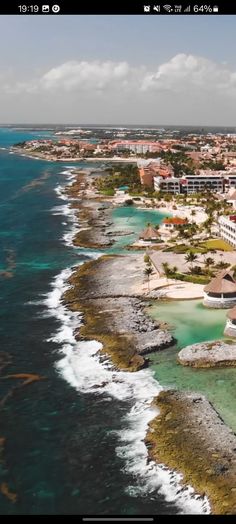 an aerial view of the beach and ocean