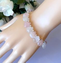 Unique Find ! Rose Quartz and Clear Quartz Bracelet in 925 Sterling Silver . Smooth 8 Briolette Stones . Subtle Pink and Clear alternate Stones  Complements most outfits . Simple and Elegant / Stylish looking  Briolette Size : 10 mm x 10 mm approx Round stones : 6 mm  Length : 7 inches + 1.50 inches Sterling Silver Spring Clasp Stone for LOVE : Rose Quartz  Stone for LUCK : Clear Quartz Hypoallergenic Sterling Silver Crystal Bracelet Gift, Spiritual Pink Jewelry For Birthday, Adjustable Rose Quartz Jewelry For Valentine's Day, Pink Sterling Silver Bracelet As A Gift, Pink Sterling Silver Bracelet For Gift, Adjustable Sterling Silver Bracelet For Valentine's Day Anniversary, Valentine's Day Gift Bracelets With Natural Stones, Silver Rose Quartz Bracelets As Gift, Silver Charm Bracelet With Natural Stones For Gift