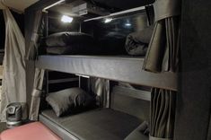 bunk beds in the back of a vehicle