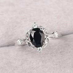 ◆ The ring is handcrafted from sterling silver and decorated with a dazzling 8*6 mm black spinel and CZs. It is suitable for engagement/anniversary/daily occasion. ◆ Production Description: Main stone Type: Natural Black Spinel Main Stone Shape: Oval Cut Main Stone Size: 8*6 mm(1.45ct) Side stone: CZ Metal: 925 Sterling silver - Other options available in the drop down menu ◆ Customization: √Free for Add Engraving √Other Metal Type Available √Other Gemstones & Shapes Available √Personalization R Gothic Promise Rings For Her, Black Diamond Engagement Ring Silver, Vampire Engagement Ring, Christmas Wedding Ring, Ring With Black Stone, Engagement Ring Black, Gothic Engagement Ring, Black Spinel Ring, Beautiful Engagement Ring