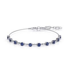 "Simple yet elegant, this Blue Sapphire and Diamond bracelet is beautiful. Set in genuine 10K White Gold, with genuine natural diamonds, lab grown gemstones and secure lobster closure. 7\" Chain bracelet with extender 3.5mm Round Lab Grown Blue Sapphires Round Natural Diamonds Also Available in: Ruby Emerald Visit our Etsy Shop to see more options! https://petitmotifjewelry.etsy.com Genuine 10K White Gold 7\" Length + 1\" extender Secure Lobster Lock All items are nicely packaged ready to gift in elegant jewelry boxes" Classic Sapphire Bracelets For Anniversary, Elegant Sapphire Tennis Bracelet With Jubilee Band, Elegant Sapphire Bracelets For Anniversary, Elegant Blue Bracelet With Brilliant Cut, Adjustable Sapphire Bracelets For Formal Events, Timeless Blue Round Bracelets, Classic Sapphire Bracelet With Prong Setting, Adjustable Sapphire Bracelets For Formal Occasions, Elegant Blue Hand Set Bracelets