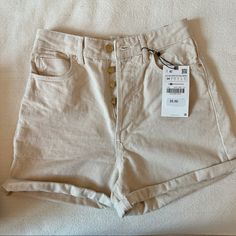 Zara High Rise Mom Shorts Brand New With Tags Size 2 (Us) Color: Beige Inseam: 4” Unrolled And 2” Rolled Rise: 15” Unrolled And 13” Rolled 22” Leg Opening Material: Cotton (Jean) ** I Have 9 Of These In Different Colors But Same Size! Check Out My Page To Add To Bundle And Save! Fast Same- Day Shipping Comes From Brand New Home~Free Of Moldtoxinssmokepet Allergens All Items In My Closet Were Originally Purchased New From Retailers- Never Secondhand Shops Tags: Altar’d State, Abercrombie & Fitch, Zara Cotton Shorts, Summer Short Pants With Button Closure, Beige High Waist Bottoms For Summer, Summer Bottoms With Button Closure And Short Length, High Rise Pants With Button Closure For Summer, Beige High Waist Cotton Shorts, Beige High-waist Cotton Shorts, Zara High-waisted Cotton Jean Shorts, Zara Cotton Bottoms Short Length