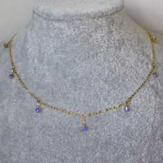 Blue Sapphire Necklace Cornflower Blue Natural Sapphire Necklace Gift for her solid 14K Yellow Gold 38- 42cm length. Introducing our captivating dainty yellow gold station necklace, adorned with seven mesmerizing pieces of vivid blue sapphire. Each gemstone embodies a fiery intensity, carefully chosen and expertly set to create a striking contrast against the warm glow of the gold. This necklace is designed to add a bold pop of color and sophistication to any attire, making it a versatile choice Spinel Jewelry, Blue Sapphire Necklace, Chocker Necklace, Sapphire Color, Station Necklace, Sapphire Necklace, Natural Blue Sapphire, Blue Necklace, Sapphire Jewelry