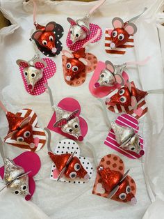 some pink and red heart shaped animal decorations