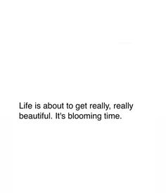 a white background with the words life is about to get really really beautiful it's blooming time