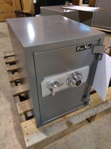 a large metal safe sitting on top of pallets