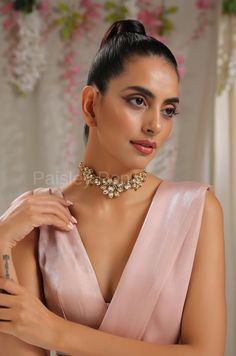 The floral Kundan choker is a celebration of the rich tradition of India that is beautifully handcrafted by the artisans to bejewel your neckline with a belief to balance the ancient and modern concepts of Indian jewelry. The Kundan choker made on 22K gold plating has a replica of Bollywood jewelry, perfect for the women who believe in carrying the light of their heritage. Add this beauty to your jewelry wardrobe and pair it up with a delicate outfit to create a bold look. Necklace Closure - Adj Elegant Kundan Necklace With Tilla For Party, Temple Jewelry Style Festive Choker Necklace, Elegant Festival Choker For Festive Occasions, Elegant Festival Choker, Gold Temple Necklace For Diwali Party, Diwali Festive Temple Choker Necklace, Bridal Necklace For Diwali Reception, Festive Temple Choker Necklace For Celebration, Festive Diwali Choker Necklace