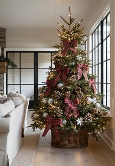 a decorated christmas tree in a living room