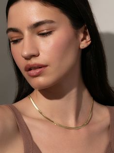 Horizon Herringbone Chain Necklace in Gold | Uncommon James Chic Herringbone Necklace With Adjustable Chain, Everyday Gold Chain Herringbone Necklace, Gold Chain Herringbone Necklace As Gift, Chic Delicate Chain Herringbone Necklace As Gift, Chic Herringbone Necklace With Delicate Chain As Gift, Chic Herringbone Necklace With Delicate Chain For Gift, Elegant Everyday Herringbone Gold Necklace, Snake Chain Necklace Choker For Gift, Elegant Everyday Herringbone Necklace With Gold Chain