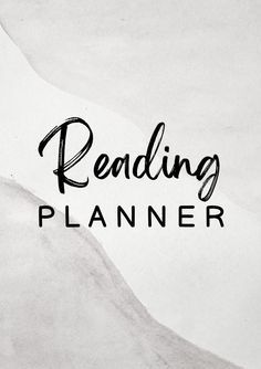 the words reading planner written in black ink on white paper with an image of a mountain