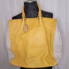 Elie Tahari Women's Leather Handbag. Yellow And Cream Color, 100% Leather, Braided Handles, And A Few Small Interior Pockets. Like New Dustbag Included. Luxury Yellow Tote Bag, Chic Yellow Pouch Shoulder Bag, Chic Yellow Pouch Satchel, Designer Yellow Rectangular Shoulder Bag, Yellow Pouch Shoulder Bag For Shopping, Designer Yellow Pouch Bag, Elegant Yellow Hobo Bag For Daily Use, Elegant Yellow Shoulder Bag For Everyday Use, Elegant Yellow Shoulder Bag For Everyday