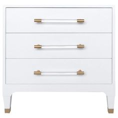 a white and gold dresser with three drawers