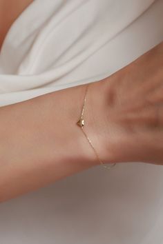 "Small Gifts With Each Order! This Bracelet is available in different gold colors (Pick the color from drop down menu) ✨ BRACELET 14K Gold Minimalist Heart Bracelet for Women,Solid Gold Bracelet,Tiny Heart Bracelet, * Gold KT: 14K Solid Gold * Bracelet Lengths: 5.5'',5.75'',6'',6.25'',6.5'',6.75'',7'',7.25'',7.5'',7.75'',8\" ✨ SHIPPING All the orders will be shipped to the shipping address supplied through your Etsy Order. Please check this address is correct before finishing your check out. Artgenie Jewelry is not responsible for packages shipped to wrong addresses. It is the buyer's responsibility to ensure that all shipping information is correct prior to finish the purchase. ✨ ESTIMATED SHIPPING TIMES USA : 2-5 Business days Canada : 3-6 Business days U.K : 2-5 Business days Europe : 1 Minimalist Heart Bracelet With Adjustable Chain For Anniversary, Minimalist Adjustable Chain Bracelet For Valentine's Day, Dainty Heart Bracelet For Everyday, Minimalist Gold Heart Bracelet, Minimalist Heart-shaped Yellow Gold Bracelet, Minimalist Heart Bracelet With Adjustable Chain, Dainty Bracelets With Heart Pendant And Adjustable Chain, Minimalist Everyday Heart Bracelet With Adjustable Chain, Minimalist Heart Bracelet With Adjustable Chain For Everyday