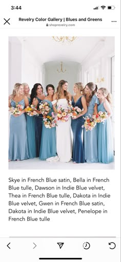 a group of women standing next to each other in front of a chandelier