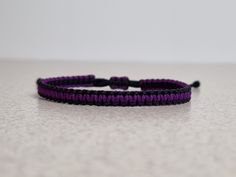 The simple two colors macrame bracelet is handmade with care and attention to details. These bracelets are made with durable yet soft nylon - the high-quality Chinese nylon cord. Each knot is meticulously tied, resulting in a stunning pattern.  The minimalist design 'friendship' bracelet. This design has been combined in two colors - black and purple. The neutral black color perfectly highlights the purple color. That creates a wonderful look. These bracelets are fully adjustable. There are avai Square Knot Friendship Bracelet, Knot Friendship Bracelet, Purple Macrame, Macrame Square Knot, Square Knot Bracelets, Bracelets For Boyfriend, Easy Paper Flowers, Square Knot, How To Make Paper Flowers