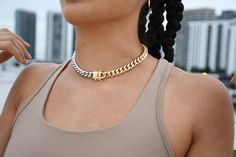 "This is a one-of-a-kind curb choker that is so unique you have to buy it just to have it! One side of this choker is white gold, and the other is 18k gold filled with a beautiful gold box clasp to secure the piece nicely! Measurements/Specs: - 14.5\" Thick Link Choker - 11mm Thick - Color is split right down the middle 🌼Check out the matching Bracelet Here: https://bit.ly/Cubanbracelets This piece looks beautiful alone or mixed and matched! 🌺 Care Instructions: -We always recommend anything t Cheap Cuban Link Metal Chain Necklace, Luxury Silver Cuban Link Box Chain Necklace, Luxury Tarnish-resistant Cuban Link Necklace, Gold Cuban Link Necklace With Curb Chain For Streetwear, Gold Chunky Chain Jewelry For Streetwear, Cuban Link Curb Chain Necklaces For Streetwear, Cuban Link Curb Chain Necklace For Streetwear, Adjustable Cuban Link Chain Jewelry For Streetwear, Streetwear Cuban Link Curb Chain Necklaces