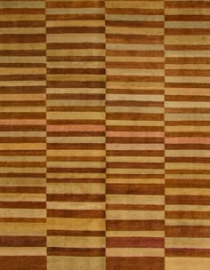 an area rug with different colored stripes on it