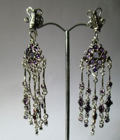 From Porans collection ----> Unique long Chandelier Earrings, 90 stones! (45 each). Gemstone and CZ A gift to your beloved It can be cheaper with different stones. Onyx, Garnet, Amethyst, Moonstone, Opal... Dimensions: Max Length: 90 mm\ 3.6 inches (from the top of the wire) Max Width: 23 mm\ 0.92 inches An amazing gift for yourself or loved ones! It comes in a beautiful jewelry gift box. We can also add a personal note in case you would like us to send it as a gift to a loved one. For more i Silver Jeweled Chandelier Earrings, Silver Jeweled Crystal Earrings, Silver Jeweled Dangle Crystal Earrings, Silver Jeweled Sterling Silver Earrings, Silver Jeweled Earrings, Silver Dangle Jewelry Jeweled, Jeweled Dangle Chandelier Earrings As Gift, Silver Jeweled Earrings As A Gift, Silver Jeweled Dangle Jewelry