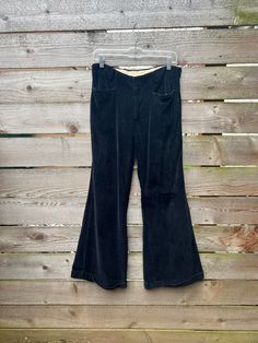 "Vintage 1960s black velvet wide leg bell bottoms. Good condition but has wear in crotch area and the fabric has clearly been worn in so has a light fade. The pant cuff creases are loose as well. Sold as is. See photos for details.  Size not marked but good for a S/M. Measurements: 60s black velvet bell bottoms 32\" waist 40\" hip 9\" rise 11\" thigh 31.5\" inseam 13\" pant opening" Black Velvet Bell Bottoms Outfit, Vintage Black Full-length Bottoms, Elegant Black Velvet Bottoms, Gothic Bell Bottoms, Black Gothic Velvet Bottoms, Velvet Bell Bottoms, Hawaiian Print Shirts, Eagle Print, Cuffed Pants