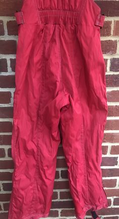 "Inseam 27\"/top of pants waist front to bottom leg hem 38\"/Top of snow bib straps to bottom 58\"without being stretched/waist 27\"-28\"approx/Good vintage condition pants quilted interior-zippers down both sides/Velcro closure at bottom legs adjustable elastic straps/smoke free environment(A)" Casual Snowboarding Pants For Ski Season, Sporty Pants For Snowboarding In Winter, Sporty Winter Pants For Snowboarding, Full Length Snowboarding Bottoms For Ski Season, Full Length Pants For Snowboarding Ski Season, Sporty Snowboarding Bottoms For Ski Season, Full Length Snowboarding Pants For Ski Season, Sporty Waterproof Snowboarding Bottoms, Sporty Winter Skiing Bottoms