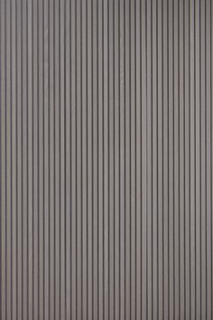 a black and white striped wallpaper with vertical lines