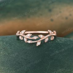 Branch Curved Wedding Band Unique Rose gold Moissanite Wedding Band Vintage Round cut ring Art deco Bridal Leaf Stacking ring Promise ring ----------Ring Details ---------- ☆Stone: Moissanite ☆Stone weight: about 0.07ct ☆Band Width: Approx. 1.3mm ☆Band Thickness: Approx. 1.2mm This ring is made of Solid gold (14k/18k gold, yellow gold, rose gold are available). All ring size can be made, please contact me if you couldn't find your ring size from the list. ----------Custom Service---------- I acc Laurel Wedding Band, Rose Gold Wedding Jewelry With Halo Design, Rose Gold Round Cut Wedding Jewelry, Rose Gold Jewelry With Prong Setting For Marriage, Rose Gold Prong Setting Wedding Ring, Rose Gold Wedding Ring With Prong Setting, Rose Gold Round Cut Bridal Sets For Wedding, Rose Gold Brilliant Cut Jewelry For Marriage, Rose Gold Round Cut Bridal Sets