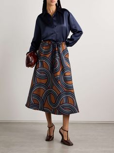 La Double J was founded over a love of vintage clothing, and it's easy to see that influence in the brand's collections. This midi skirt is jacquard-knitted with a swirling pattern and has an adjustable grosgrain drawstring.