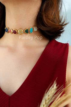 The multicolored choker is flawlessly handcrafted with carved acrylic stones by the artisans of India to celebrate beauty with the heritage of rich old Indian Jewelry. The western necklace is made on 22K gold plating and has multicolor stones to give you color therapy. Add this gold choker to your style and make your mark in all your festive or contemporary ensembles. Necklace Closure - Lobster Style Tip - This design is a perfect intersection of bohemian and traditional, put together thoughtful Vintage Indian Jewelry, Sabyasachi Jewelry, Western Necklace, Choker Necklace Designs, Sabyasachi Jewellery, Fancy Jewelry Necklace, Western Necklaces, Stone Choker, Fancy Jewellery