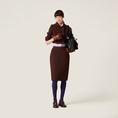 Find MIU MIU Natté Pencil Skirt on Editorialist. Straight fit Lined Single vent at back Hook and zip closure at back Logo lettering Brown Pencil Skirt, Pencil Silhouette, Wool Pencil Skirt, Cocoa Brown, Ready To Wear Collection, Refined Style, Professional Look, Skirts For Sale, A Hook