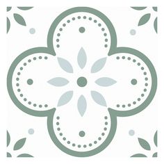 a white and green tile design with leaves on it's sides, in the shape of a flower