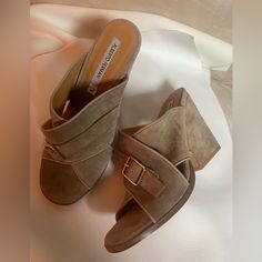 New. Size 38.5 Which Will Fit A 7.5-8. Taupe Suede. Silver Hardware. Suede Uppers, Leather Lining & Footbed, Leather Outsole. 3.5” Heels. No Original Box. Chic Slip-on Sandals With Heel Loop, Suede Open Toe Wedge Sandals With Wrapped Heel, Suede Closed Toe Sandals For Work, High Heel Suede Wedge Sandals With Heel Loop, Medium Width Open Toe Suede Mules, Chic Open Toe Suede Wedge Sandals, Elegant Suede Slip-on Sandals, High Heel Sandals With Wrapped Heel For Work, Designer Suede Heels For Spring