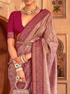 With its captivating purple color and intricate zari weaving work, this elegant silk saree is a true masterpiece. Crafted with meticulous attention to detail, the saree is made from high-quality silk material that feels luxurious against the skin. The entire saree is adorned with exquisite zari weaving work, adding a touch of opulence to its already regal appearance.
One of the standout features of this saree is the attached tassels on the pallu, which give it a stylish and contemporary look. Th Elegant Paithani Silk Pre-draped Saree For Designer Wear, Purple Dola Silk Pre-draped Saree With Self Design, Elegant Pre-draped Jamawar Saree With Pallu, Purple Paithani Silk Pre-draped Saree For Wedding, Purple Zari Work Blouse Piece For Puja, Purple Blouse Piece With Zari Work For Puja, Elegant Festive Choli With Zari Weaving, Elegant Traditional Wear With Motifs For Puja, Elegant Blouse Piece With Zari Work In Jamawar