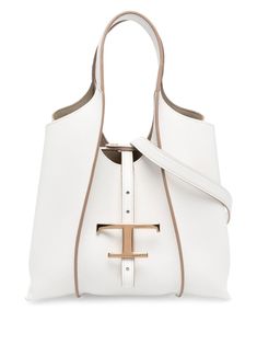 Timeless logo charm tote bag from TOD'S featuring calf leather, logo charm, press-stud fastening, two long top handles, main compartment and white. | Tod's Timeless logo charm tote bag White Top Handle Shoulder Bag With Logo Hardware, White Shoulder Bag With Logo Hardware, Elegant Tan Bag With Logo Hardware, Designer Shopping Bag With Metal Logo, White Rectangular Bag With Metal Logo, Classic White Shoulder Bag With Logo Hardware, Timeless Shoulder Bag With Logo Hardware, Timeless Shoulder Bag With Logo Hardware For Everyday Use, Timeless Rectangular Bag With Logo Hardware